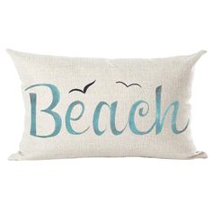 a pillow with the words beach on it