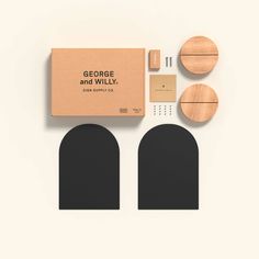 an assortment of wood and leather items on a white surface, including two oval shaped wooden pieces