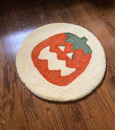 a door mat with a pumpkin on it