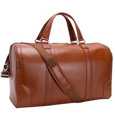 An elegant duffle perfect for a weekend business trip or exotic getaway. Its smooth design and smart style will have you feeling like you’re in command of the skies! Designed to be carried in hand or as a crossbody for ultimate comfort and mobility. Features: Top Grain Cowhide Leather 20.5" x 9" x 12" and 4 lbs. Business organizer Interior slip pocket Tablet pocket Locking double zipper closings Detachable shoulder strap Back zipper pocket Style #8819 Luxury Travel Bag With Large Capacity For On-the-go, Luxury Large Capacity Travel Bag For On-the-go, Luxury Travel Briefcase With Luggage Sleeve, Luxury Cognac Duffle Bag For Travel, Luxury Luggage With Leather Lining For On-the-go, Luxury Large Capacity Briefcase For On-the-go, Classic Cognac Business Duffle Bag, Classic Cognac Travel Bag For Business Trips, Luxury Cognac Briefcase With Luggage Sleeve