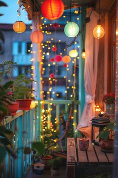 Cozy balcony decorated with colorful paper lanterns, twinkling string lights, and various potted plants creating a festive, inviting atmosphere. Fairy Lights Decor Balcony, Cute Patios Apartment, Cute Small Balcony Ideas, Porch Decorating Apartment, Narrow Balcony Decor, Apartment Deck Decorating, Small Patio Ideas Apartment Tiny Balcony, Small Balcony Decor Indian, Tiny Balcony Decor