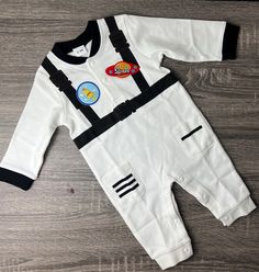 Astronaut Costume Baby Costume Children's Romper Outift Halloween Costume Idea Astronaut Suit Dress Up Rocket Planet Space Print Bodysuit  Your little one will be out of this world 🌎 in this costume ensemble  🚀  3-2-1 liftoff!  Set is size 0-3 months, other sizes available upon request.  Astronaut Costume Baby Costume Children's Romper Outift Halloween Costume Idea Astronaut Suit Dress Up Rocket Planet Space Print Bodysuit  Check out our other designs in our shop. Thanks for shopping by.  Our Astronaut Suit, Astronaut Costume, Halloween Costume Idea, Baby Costume, Suit Dress, Space Print, Baby Costumes, Print Bodysuit, Girl Costumes