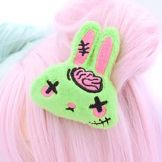 "Add a touch of quirky charm to your hairstyle with our Plush Anime Style Kawaii Zombie Bunny Hair Clip! Crafted from vibrant bright lime green minky fabric, this adorable hair clip features a sweet-faced bunny with hot pink brains and stitches embroidered using the highest quality threads. Each detail is meticulously crafted from a design drawn and digitized by me, ensuring a unique and eye-catching accessory. Handmade with love in the USA, this super cute zombie bunny hair clip is perfect for those who love to stand out from the crowd. Whether you're attending a cosplay event, Halloween party, or just adding a playful twist to your everyday style, this hair clip is sure to make a statement. Don't forget to check out the matching earrings available in my shop to complete your look! Be the Things To Add To Your Wishlist, Gurokawaii Fashion, Zombie Cute, Kawaii Zombie, Bunny Hair Clip, Zombie Bunny, Goth Rockabilly, Kawaii Monster, Clothing Kawaii