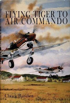 an old book with two planes flying in the sky