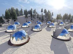 an artist's rendering of several blue and white domes in the middle of snow