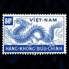 a stamp with an image of a blue dragon on it's front and the words,