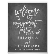 a chalkboard sign with the words welcome to the engagement party, written on it