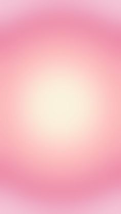 a blurry pink and white background