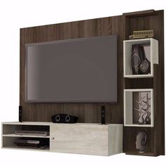 an entertainment center with a flat screen tv mounted on it's side and shelves