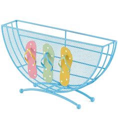 two pairs of flip flops are in a blue wire basket on a white background