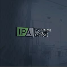 the logo for investment property advisory advisors is displayed in front of a glass wall