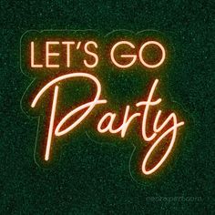 a neon sign that says let's go party