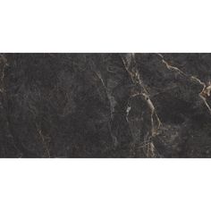 a black marble textured wallpaper with gold veining on the top and bottom