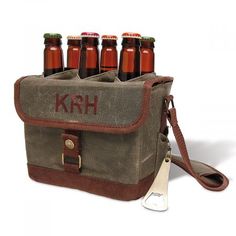 a cooler bag with six beer bottles in it