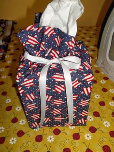 an american flag wrapped present on a table