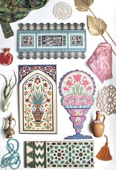 an assortment of decorative items displayed on a white surface, including vases and plates