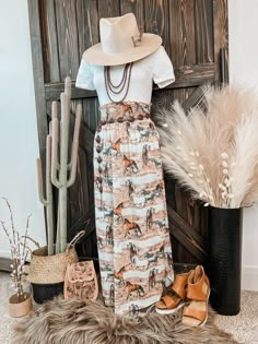 Horse graphic maxi skirt with smock elastic waist. Has a relaxed fit. Woven maxi skirt. Runs true to size with great stretch. Material: 95% Polyester | 5% Spandex Small (2/4/6) | Medium (6/8/10) | Large (10/12/14) | XL (14/16/18) Rodeo Clothes Ranch Dress'n Western Boutique, Express Southwest Print Skirt, Weatern Tooled Skirt, Southwest Print Skirt, Hean Skirt Fall Western, Western Teacher Outfits, Western Skirt Outfits, Horse Graphic, Native American Print