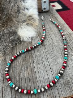 "Beautiful Navajo Style Necklace made with 6 and 8mm silver pearls, turquoise & coral acai Beads ~ Choose Your Length ~ A lovely strand of Navajo Style pearls made by artists for Navajo Pearls Ranch, each bead is heavily plated in .925 sterling silver, hand polished & antiqued, creating a perfect Western Pearl! You won't find a better price for a necklace like this anywhere in the world! Silver bead sizes are sizes 6 and 8mm Turquoise beads are 7mm Coral Acai beads are 6mm Choose your length fro Western Beaded Necklace, Navajo Pearls Necklace, Western Fashion Jewelry, Stone Bead Jewelry, Navajo Necklace, Navajo Pearls, Navajo Style, Bead Sizes, Pearls Necklace