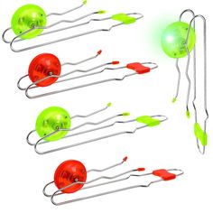 four green and red objects are in the shape of balls, hooks, and wires