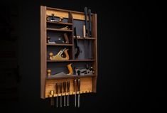 a wooden shelf filled with tools on top of a black wall next to a pair of scissors