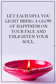 a pink bowl with a lit candle in it and the words let each diya you light bring a glow of happiness on your face and enlighten your soul