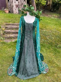 a dress on display in the grass