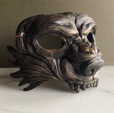 This handmade imposing wolf mask will make a perfect addition to any room in your home! Originally sculpted in clay then casted in a high-density epoxy for a lightweight finished product and added durability. Each mask is hand painting to the desired color and sheen. This item is one of the many color options available in my store. Don't see a color you like? Send me a message for possible custom color options. FOR DECORATION PURPOSES ONLY. NOT MADE TO WEAR. Wolf Mask, Sick Tattoo, Bird Masks, Skull Sticker, Grand Rapids Mi, Animal Skulls, Hand Painting, Grand Rapids, May 21