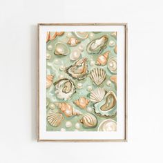 an art work with seashells and shells on the wall