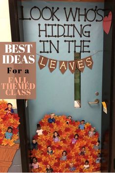 a door decorated with fall leaves and the words look who's hiding in the leaves