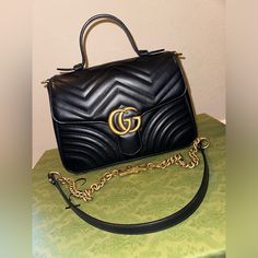 Marmont Top Handle Bag Small Black Perfect Everyday Bag With Lots Of Interior Room, Zipper Pocket And Attached Pouch This Bag Is In Perfect Condition (No Bulging, No Interior Stains, No Scratches) Comes With Box, Dust Bag, Receipt, Ribbon And Gift Bag Gucci Satchel With Top Handle And Branded Hardware, Gucci Top Handle Bag With Branded Hardware, Gucci Top Handle Bag With Logo, Gucci Crossbody Satchel, Gucci Crossbody Satchel With Top Carry Handle, Gucci Top Handle Bag With Gold-tone Hardware, Gucci Bag With Gold-tone Hardware And Top Handle, Gucci Top Handle Satchel, Gucci Bags With Detachable Strap