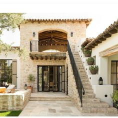 an outside view of a house with stairs