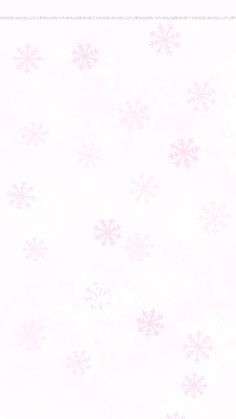 a white background with pink snowflakes on it