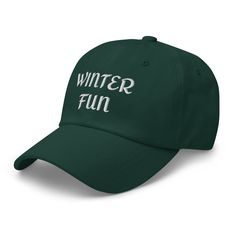 Dad hats aren't just for dads. Get your Winter Fun hat and get ready for some cold winter fun! 100% chino cotton twill Unstructured, 6-panel, low-profile with 6 embroidered eyelets 3 ⅛” (7.6 cm) crown and adjustable strap with antique buckle FREE SHIPPING! Please allow 7 -12 days for delivery. This product is made especially for you as soon as you place an order, which is why it takes us a bit longer to deliver it to you. Making products on demand instead of in bulk helps reduce overproduction, Adjustable Cotton Winter Hat, Adjustable Cotton Hats For Winter, Winter Cotton Hats With Letter Print, Winter Snapback Hat With Letter Print, Casual Winter Trucker Hat With Letter Print, Casual Trucker Hat With Letter Print For Winter, Casual Winter Hats With Letter Print, Adjustable Cotton Baseball Cap For Winter, Trendy Winter Outdoor Baseball Cap