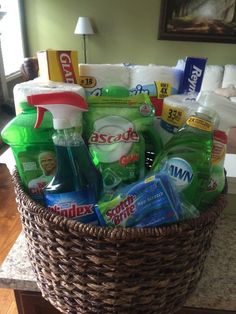 a basket filled with cleaning products on top of a counter