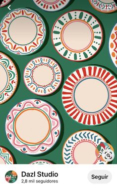 an image of some colorful plates on a green background with the words dazi studio