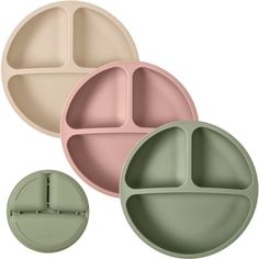 three different colored plates with compartments for food