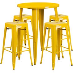 four yellow metal stools and a round table with four barstools on each side