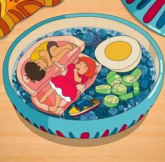 there is a bowl filled with food and two people laying in the bowl next to each other