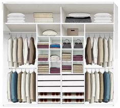 an organized closet with white shelves and drawers