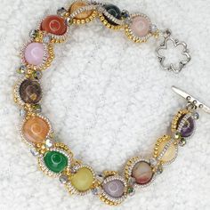 Handmade~Empty Nest Gemstone Bracelet Made With A Variety Of Gemstones Along With Silver And Gold Galvanized Seed Beads And Crystals 7½" In Length Handmade By Me! Designed By Allie Buckman At Potomacbeads Dot-Com Gift Box Available Upon Request New In Package Any Questions? Just Ask! Daily Shipping~Packaged With Care! Open To Offers! Round Crystal Jewelry With Gemstone Accents, Agate Crystal Bracelet With Gemstone, Multicolor Crystal Jewelry With Jubilee Bracelet, Crystal Gemstone Beaded Bracelets, Round Agate Crystal Bracelet With Natural Stones, Crystal Jubilee Bracelet With Round Beads, Crystal Stone Bracelet Jewelry, Crystal Jewelry With Jubilee Bracelet And Round Beads, Jubilee Crystal Bracelet With Round Beads