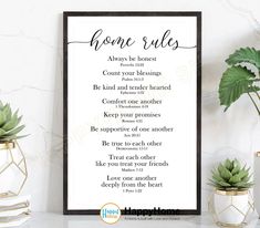 a poster with the words home rules on it next to potted plants and books