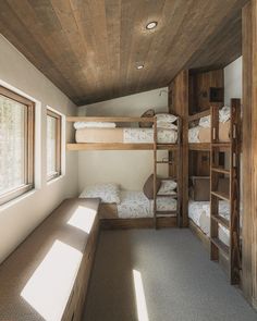 the bunk beds in this room are made of wood