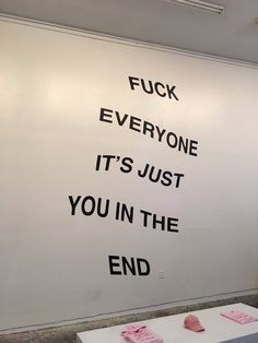 there is a sign on the wall that says it's just you in the end