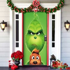 the grin door cover is decorated with christmas decorations