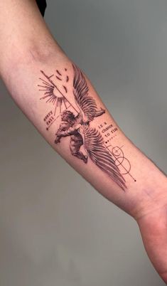 a person's arm with a tattoo on it that has an eagle and words