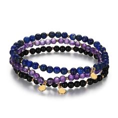 PRICES MAY VARY. Set of three genuine gemstone stretch bracelets featuring 4mm black agate, African amethyst, and Lapis Lazuli beads in a station design Bracelets accented with 18k yellow gold plated bronze spacer beads and tags Perfect jewelry gift to expand a woman's fashion wardrobe with a modern, on trend style Bracelets can be worn individually or all together for a trendy layered look Hand-crafted in Bronze; Fine Silver plating added to increase durability; 18K Yellow Gold plating added to Purple Stackable Jewelry With Round Beads, Black Amethyst Beaded Bracelets, Black Amethyst Gemstone Beaded Bracelets, Gold Beaded Bracelets, Purple Bracelet, Dainty Bracelet, Gold Bead Bracelets, Woman's Fashion, Bracelet Design