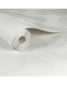 a roll of white wallpaper with wavy lines on the bottom and side of it