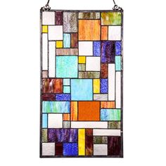 a colorful stained glass window hanging on a metal frame with an iron bar in the middle