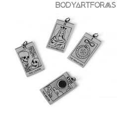 four pendants depicting the virgin mary and baby jesus, each with a skull on it