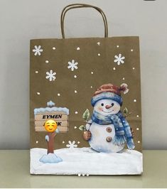 a bag with a snowman on it and a sign that says exmen bank